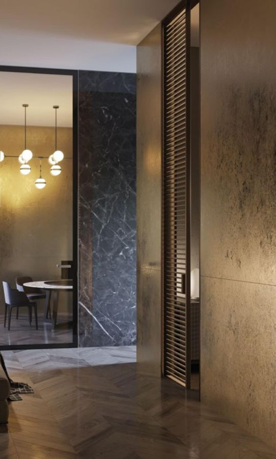 BRISK Theron glass door in a dark marble wall